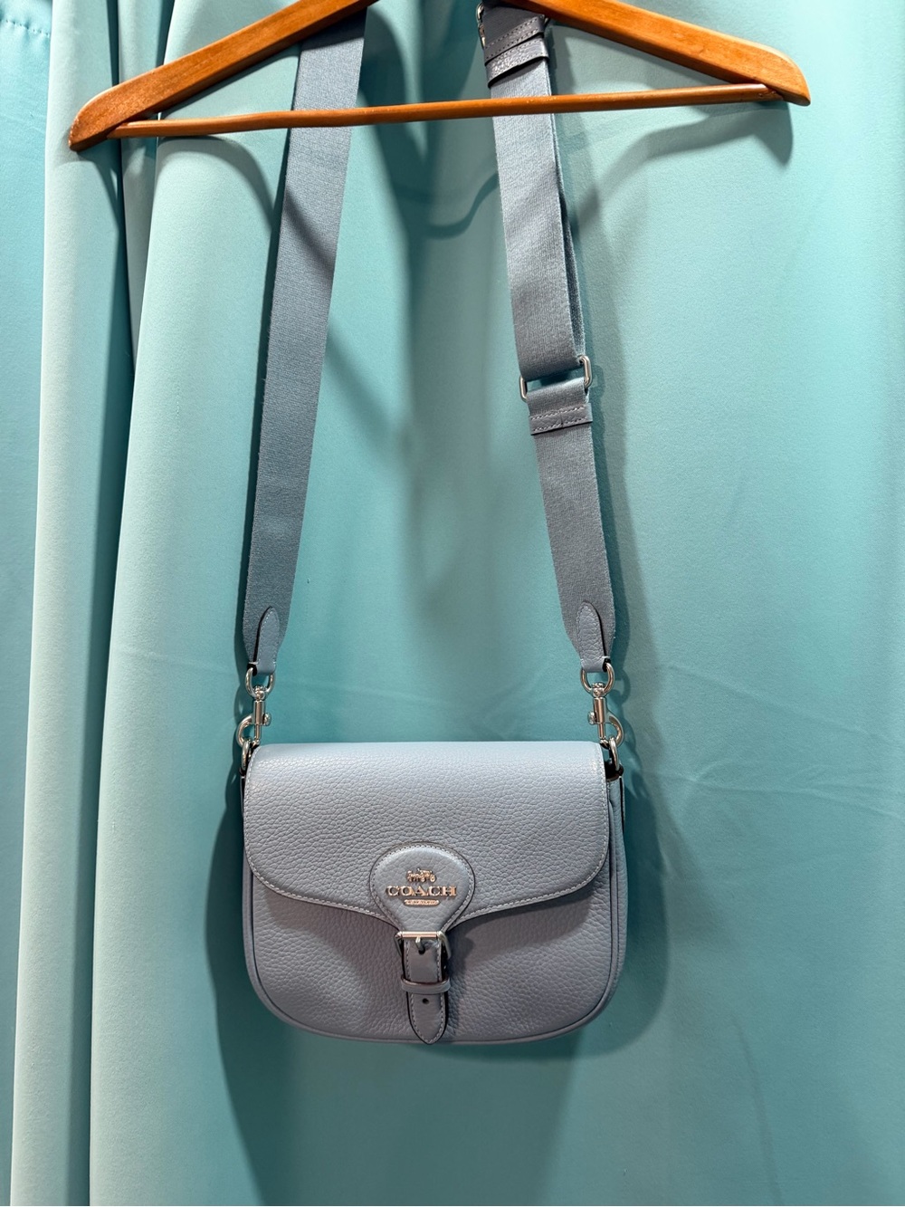 Coach Amelia Saddle bag. Light Blue Pebble Leather Crossbody with Buckle Detail